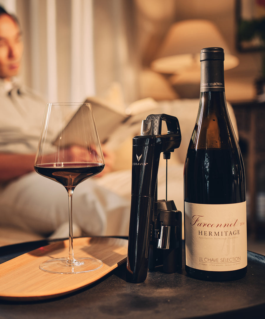 One glass poured, the bottle stays sealed and waiting